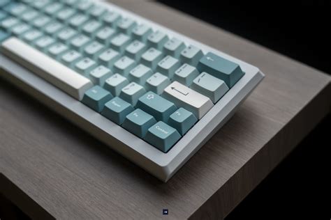 Gmk iceberg - honestly its more of a middle ground of high/low profile, its not visible to regular use, but if you just tilt your vision a little you can see the switches. doesnt make great side photos. depends on your keycaps. With gmk it looks fine, with pbt sets from China it doesnt, because they are not really cherry profile. OEM looks ok too. 